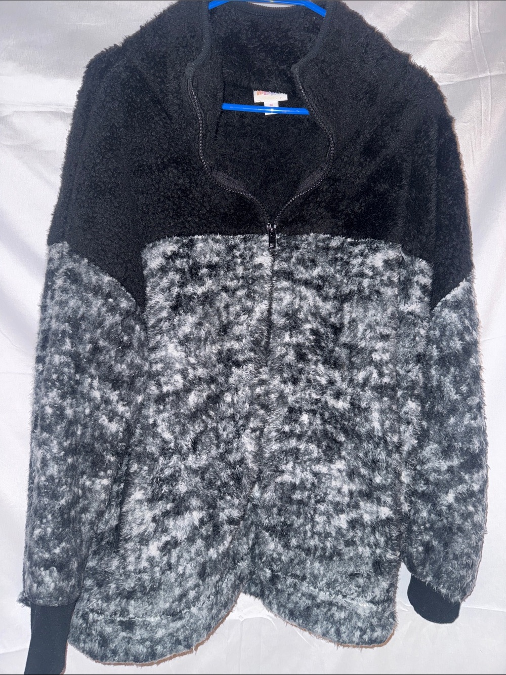 LuLaRoe Black Garment With Multicolor Logo Tag